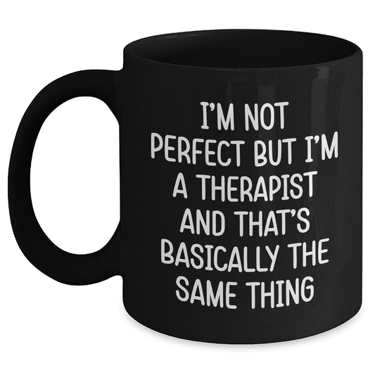 Funny Therapist Gifts for Men, Women, Friends - 'I'm Not Perfect But I'm A Therapist' Black Coffee Mug for Graduation, Unique Gifts from Friends, Coworkers, Family - Main