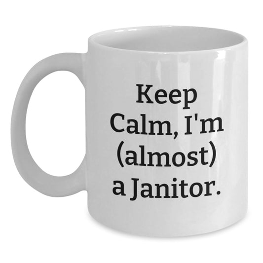 Funny Janitor Gifts, White Coffee Mugs - 'Keep Calm, I'm (almost) A Janitor' for Men and Women, Gifts from Friends and Family for Graduation - Main
