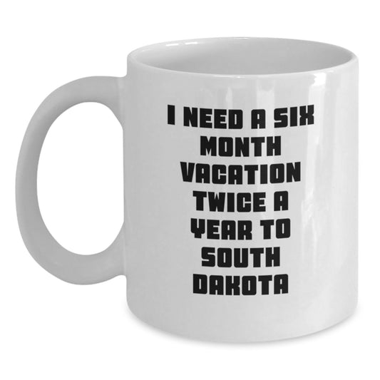 Funny South Dakota Gifts, Unique White Coffee Mug for Graduation, 'I Need A Six Month Vacation Twice A Year To South Dakota', Gifts from Friends for South Dakota Lovers - Main