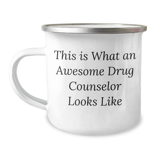 Gifts from Friends for Awesome Drug Counselor Graduate - 'This Is What An Awesome Drug Counselor Looks Like' Quote on Camping Mug, 12 oz Stainless Steel with Enamel Finish - Image 1