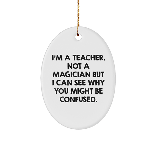 Gifts from Friends for Teachers - 'I'm A Teacher. Not A Magician' Oval Ornament, White, 3.25" Tall, Christmas Unique Gifts - Image 1