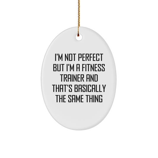 Funny Fitness Trainer Oval Ornament Gifts from Friends for Christmas, 'I'm Not Perfect But I'm A Fitness Trainer And That's Basically The Same Thing' Fitness Trainer Gifts, Oval Shape, White Color - Image 1