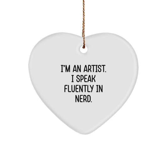 Artist's Humorous Heart Ornament, 'I'm An Artist. I Speak Fluently In genius.' Gifts from Friends, Coworkers, or Family for Christmas - Image 1
