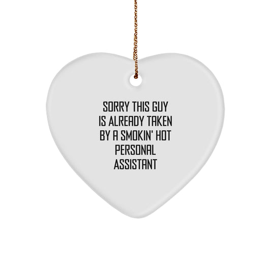 Funny Personal Assistant Gifts from Friends, Heart Ornament for Christmas with 'Sorry This Guy Is Already Taken By A Smokin' Hot Personal Assistant' Quote - Image 1