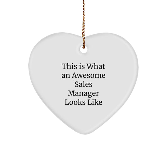 Funny Sales Manager Gifts from Friends or Coworkers - Heart Ornament with 'This Is What An Awesome Sales Manager Looks Like' Quote for Christmas - Image 1