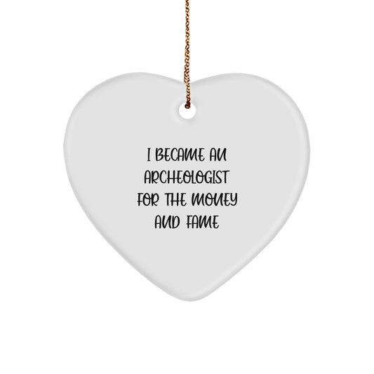 Archeologist Gifts for a Unique Christmas - 'I Became An Archeologist For The Money And Fame' Heart Ornament, Gifts from Friends for Archeologists - Image 1