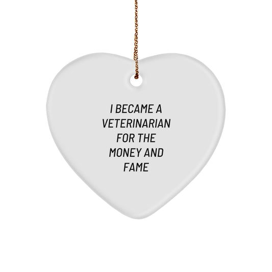 Gifts from Friends for Veterinarian - 'I Became A Veterinarian For The Money And Fame' Funny Heart Ornament for Christmas - Image 1