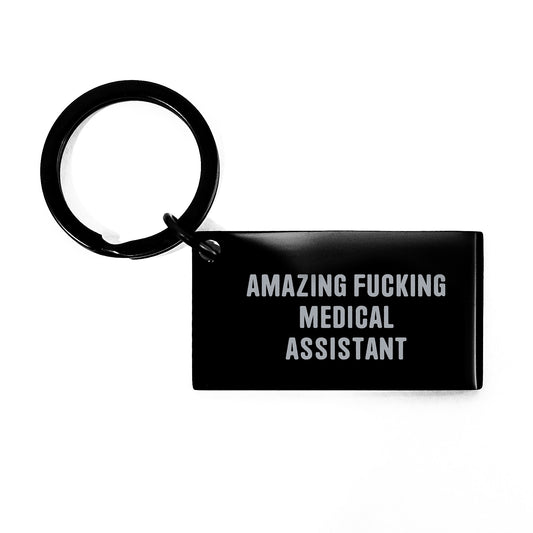 Medical Assistant Gifts from Friends, Funny Keychain for Medical Assistant Graduation, 'Amazing F--king Medical Assistant' Quote, Stainless Steel, Black Color, 1.57 x 0.87 inches - Image 1