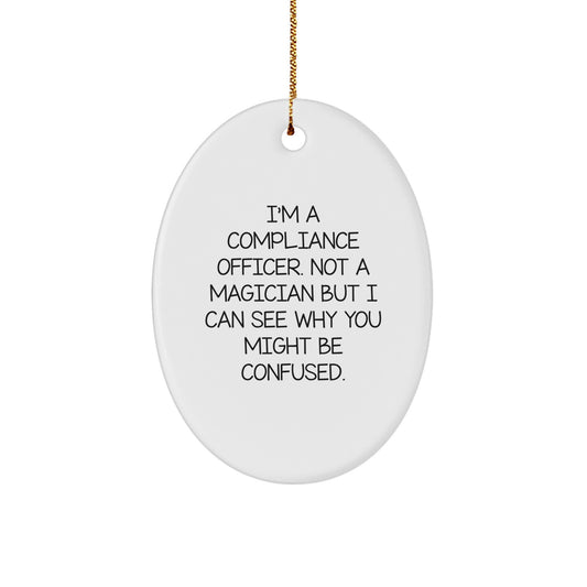 Compliance Officer Gifts for Christmas - Funny Oval Ornament from Friends 'I'm A Compliance Officer. Not A Magician...' - Image 1