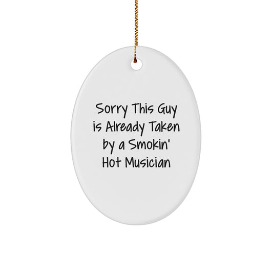 Funny Musician Gifts for Friends, Family, and Loved Ones - Sorry This Guy Is Already Taken By A Smokin' Hot Musician Oval Ornament, White, 3.25" Tall, Christmas - Image 1