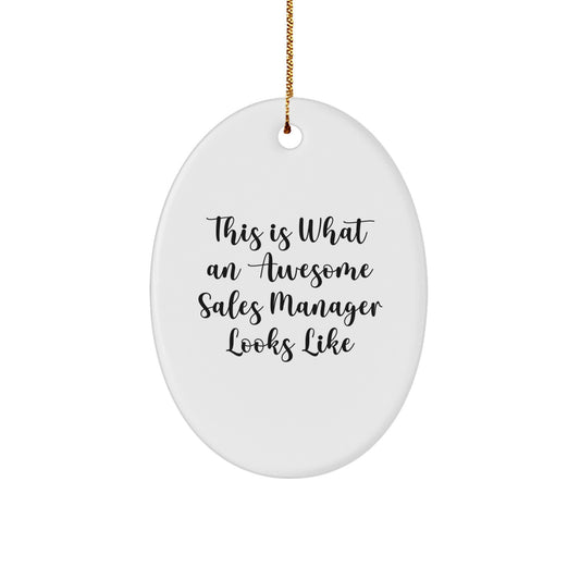Funny Sales Manager Gifts - 'This Is What An Awesome Sales Manager Looks Like' Oval Ornament, White, Christmas Unique Gifts from Friends - Image 1