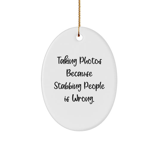 Taking Photos Gifts for Men, Women, Friends, Coworkers, and Family - Oval Ornament with Funny Quote 'Taking Photos Because Stabbing People Is Wrong.' - Christmas Unique Gifts from Friends and Family - Image 1